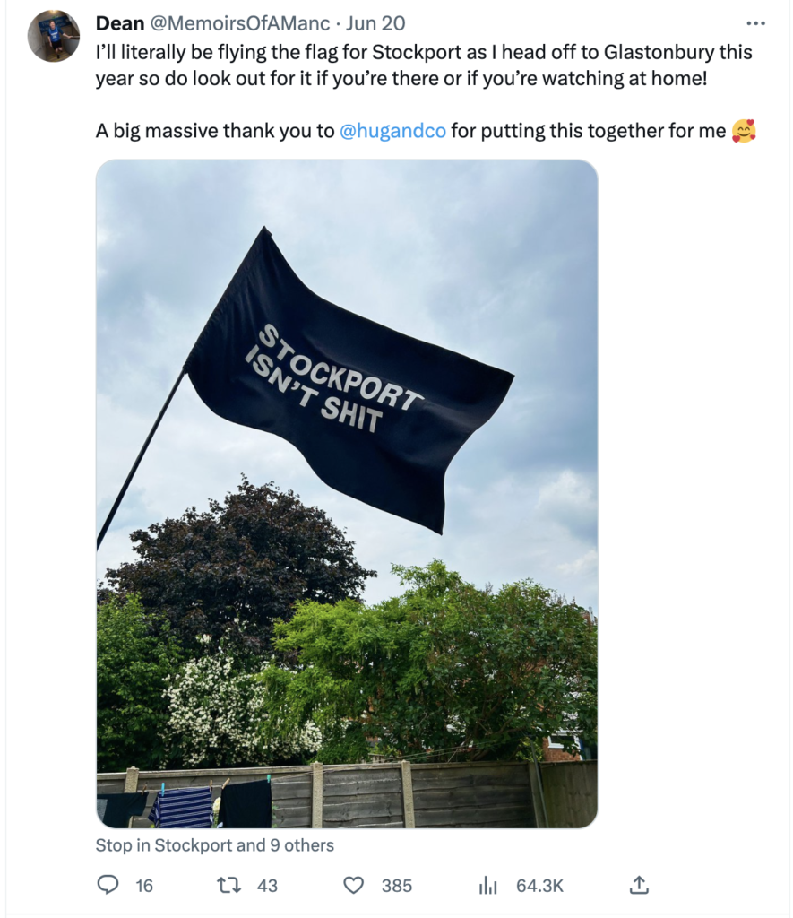 Stockport isn't shit Glastonbury twitter post of a flag saying stockport isn't shit